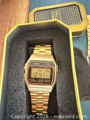 MaxSold Auction: 2 Casio CA-506 Water Resist Alarm Chronograph Calculator Watch GOLD Tone digital  - Toronto (Ontario, Canada) SELLER MANAGED Downsizing Online Auction - Applefield Drive