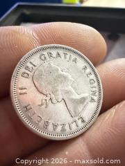 MaxSold Auction: Canada 1962 25c Canadian Caribou Quarter Coin - 80% Silver - Toronto (Ontario, Canada) SELLER MANAGED Downsizing Online Auction - Applefield Drive