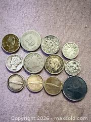 MaxSold Auction: Lot of 12 vintage silver coins  - Toronto (Ontario, Canada) SELLER MANAGED Downsizing Online Auction - Applefield Drive