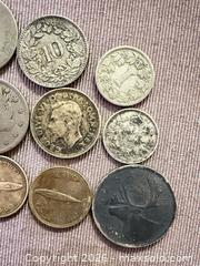 MaxSold Auction: Lot of 12 vintage silver coins  - Toronto (Ontario, Canada) SELLER MANAGED Downsizing Online Auction - Applefield Drive