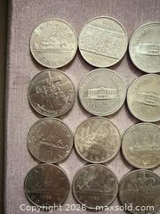 MaxSold Auction: Lot of 24 Vtg Canada 1 dollar  - Toronto (Ontario, Canada) SELLER MANAGED Downsizing Online Auction - Applefield Drive