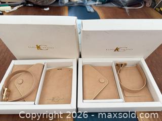 MaxSold Auction: Set of 2 LUISA CERANO beige leather accessories, including card holder  luggage tag. - Toronto (Ontario, Canada) SELLER MANAGED Downsizing Online Auction - Applefield Drive