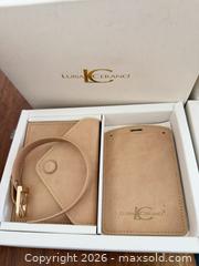 MaxSold Auction: Set of 2 LUISA CERANO beige leather accessories, including card holder  luggage tag. - Toronto (Ontario, Canada) SELLER MANAGED Downsizing Online Auction - Applefield Drive