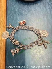 MaxSold Auction: Sterling silver charm bracelet  - Toronto (Ontario, Canada) SELLER MANAGED Downsizing Online Auction - Applefield Drive