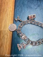 MaxSold Auction: Sterling silver charm bracelet  - Toronto (Ontario, Canada) SELLER MANAGED Downsizing Online Auction - Applefield Drive
