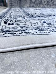 MaxSold Auction: 8'x10' Navy Blue Persian inspired Area Rug - Los Angeles (California, USA) SELLER MANAGED Downsizing Online Auction - North Wilmington Boulevard