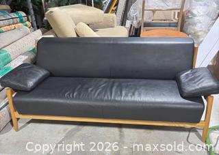 MaxSold Auction: Mid-Century Modern small vegan Leather Sofa, Black & Natural Wood - Los Angeles (California, USA) SELLER MANAGED Downsizing Online Auction - North Wilmington Boulevard