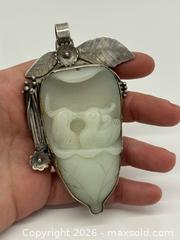 MaxSold Auction: Antique Carved Jade Bird Motif Pendant in Sterling Silver Mounting - Toronto (Ontario, Canada) PARTNER MANAGED Estate Sale Online Auction - Glen Road