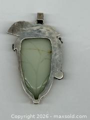 MaxSold Auction: Antique Carved Jade Bird Motif Pendant in Sterling Silver Mounting - Toronto (Ontario, Canada) PARTNER MANAGED Estate Sale Online Auction - Glen Road