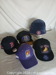 MaxSold Auction: Assorted Sports Hats – 5 - Sun City (Arizona, USA) SELLER MANAGED Reseller Online Auction - West Forrester Drive