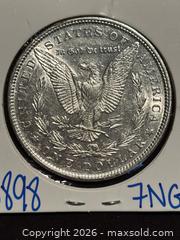 MaxSold Auction: 1879 MORGAN SILVER DOLLAR! BEAUTIFUL  Coin! WOW!    - Aurora (Ontario, Canada) SELLER MANAGED Estate Sale Online Auction - Closs Square