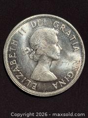 MaxSold Auction: 1962 CANADIAN SILVER DOLLAR Queen Elizabeth II COIN 80% Silver -  Nice!  - Aurora (Ontario, Canada) SELLER MANAGED Estate Sale Online Auction - Closs Square