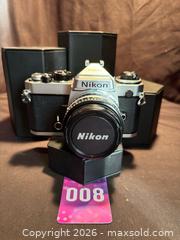 MaxSold Auction: Nikon FE 35mm SLR Film Camera with Nikon Nikkor 50mm 1:1.8 Series E  Lens, Vintage - Aurora (Ontario, Canada) SELLER MANAGED Estate Sale Online Auction - Closs Square