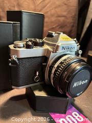 MaxSold Auction: Nikon FE 35mm SLR Film Camera with Nikon Nikkor 50mm 1:1.8 Series E  Lens, Vintage - Aurora (Ontario, Canada) SELLER MANAGED Estate Sale Online Auction - Closs Square