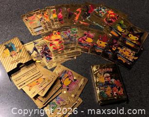 MaxSold Auction: Lot of Gold Foil Pokemonish Cards - Hamilton (Ontario, Canada) SELLER MANAGED Downsizing Online Auction - Moffat Road
