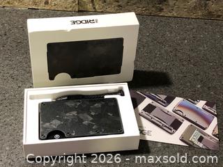 MaxSold Auction: The Ridge Forged Carbon Fiber Cash Strap - Hamilton (Ontario, Canada) SELLER MANAGED Downsizing Online Auction - Moffat Road