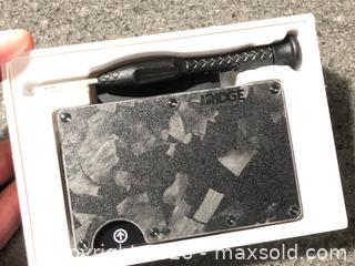 MaxSold Auction: The Ridge Forged Carbon Fiber Cash Strap - Hamilton (Ontario, Canada) SELLER MANAGED Downsizing Online Auction - Moffat Road
