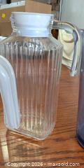 MaxSold Auction: 3 jugs  one glass 2 plastic - Tay (Ontario, Canada) SELLER MANAGED Downsizing Online Auction - Reeves Road
