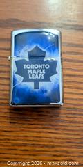 MaxSold Auction: Toronto Maple Leafs & 1 wick zippo lighter - Tay (Ontario, Canada) SELLER MANAGED Downsizing Online Auction - Reeves Road