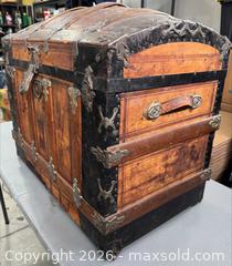 MaxSold Auction: Antique Domed Wooden Trunk/Chest with Ornate Hardware (32"W x 18"D x 28"H)   - London (Ontario, Canada) SELLER MANAGED Downsizing Online Auction - Brock Street