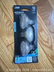 MaxSold Auction: Mixed household Basket with Duracell batteries, LED MR16 bulbs, flashlight - Cambridge (Massachusetts, USA) PARTNER MANAGED Estate Sale Online Auction - Creighton Street                  