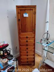 MaxSold Auction: Tall Solid Wood Pine Cabinet with 9 Drawers, Honey Finish - Cambridge (Massachusetts, USA) PARTNER MANAGED Estate Sale Online Auction - Creighton Street                  