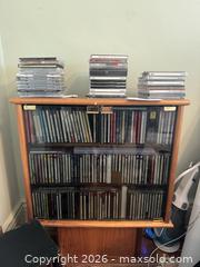 MaxSold Auction: Wood CD Storage Cabinet with Glass Doors and 200+ CDs - Cambridge (Massachusetts, USA) PARTNER MANAGED Estate Sale Online Auction - Creighton Street                  