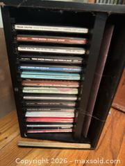 MaxSold Auction: Wood CD Storage Cabinet with Glass Doors and 200+ CDs - Cambridge (Massachusetts, USA) PARTNER MANAGED Estate Sale Online Auction - Creighton Street                  