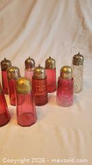 MaxSold Auction: Cranberry glass sugar casters  - Toronto (Ontario, Canada) SELLER MANAGED Estate Sale Online Auction - Amelia Street