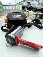 MaxSold Auction: Sanyo Xacti Red Digital Camcorder -iw - Maple Ridge (British Columbia, Canada) PARTNER MANAGED Estate Sale Online Auction - 203 Street (STORAGE)