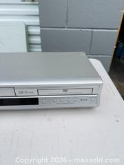 MaxSold Auction: Toshiba DVD/VCR Combo SD-V392SC2 - Silver -iw - Maple Ridge (British Columbia, Canada) PARTNER MANAGED Estate Sale Online Auction - 203 Street (STORAGE)