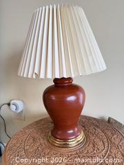 MaxSold Auction: Carved Hardwood Round Side Table with Lamp, Pillows & Ceramic Pot - Victoria (British Columbia, Canada) PARTNER MANAGED Moving Online Auction - Slater Street (CONDO)