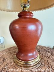 MaxSold Auction: Carved Hardwood Round Side Table with Lamp, Pillows & Ceramic Pot - Victoria (British Columbia, Canada) PARTNER MANAGED Moving Online Auction - Slater Street (CONDO)