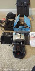 MaxSold Auction: Mixed Camera & Optics Lot with Pentax Optio WPi and binocular - Victoria (British Columbia, Canada) PARTNER MANAGED Moving Online Auction - Slater Street (CONDO)