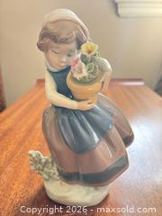 MaxSold Auction: Lladro Porcelain Figurine - Girl Holding Flower Pot - Wellesley (Massachusetts, USA) PARTNER MANAGED Downsizing Online Auction - Mayo Road