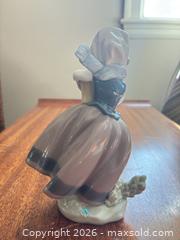 MaxSold Auction: Lladro Porcelain Figurine - Girl Holding Flower Pot - Wellesley (Massachusetts, USA) PARTNER MANAGED Downsizing Online Auction - Mayo Road