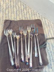 MaxSold Auction: Mixed Silverplate Flatware, Serving Utensils & Candlesticks, 20+ pcs - Wellesley (Massachusetts, USA) PARTNER MANAGED Downsizing Online Auction - Mayo Road