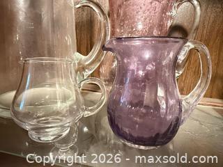 MaxSold Auction: Vintage Mid-Century Glass Pitcher, Creamers, Pink and Purple pitchers - Wellesley (Massachusetts, USA) PARTNER MANAGED Downsizing Online Auction - Mayo Road