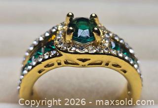 MaxSold Auction: Costume jewelry.  Gold tone ring with green stones and faux diamonds. - Burnaby (British Columbia, Canada) SELLER MANAGED Downsizing Online Auction - Claude Avenue