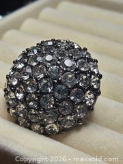MaxSold Auction: Costume Jewelry ring.  Black background with Faux diamonds.  Adjustable - Burnaby (British Columbia, Canada) SELLER MANAGED Downsizing Online Auction - Claude Avenue