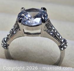 MaxSold Auction: Costume Jewelry ring.  Silver tone with large solitare and side stones - Burnaby (British Columbia, Canada) SELLER MANAGED Downsizing Online Auction - Claude Avenue