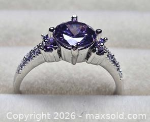 MaxSold Auction: Costume jewelry.  Silver tone ring with large Purple Solitare stone and side stones. - Burnaby (British Columbia, Canada) SELLER MANAGED Downsizing Online Auction - Claude Avenue