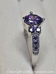 MaxSold Auction: Costume jewelry.  Silver tone ring with large Purple Solitare stone and side stones. - Burnaby (British Columbia, Canada) SELLER MANAGED Downsizing Online Auction - Claude Avenue