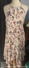 MaxSold Auction: Floral Sundress with lining and asymmetrical bottom hem and pockets! size large - Burnaby (British Columbia, Canada) SELLER MANAGED Downsizing Online Auction - Claude Avenue