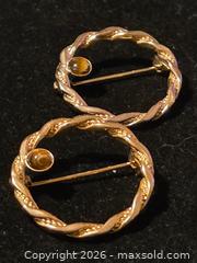 MaxSold Auction: Jewelry.   2 Gold tone Brooches with tiger eye cabuchon - Burnaby (British Columbia, Canada) SELLER MANAGED Downsizing Online Auction - Claude Avenue