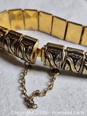 MaxSold Auction: Jewelry. Articulated Gold/ Black Bracelet with leaf designs - Burnaby (British Columbia, Canada) SELLER MANAGED Downsizing Online Auction - Claude Avenue
