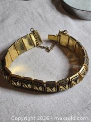 MaxSold Auction: Jewelry. Articulated Gold/ Black Bracelet with leaf designs - Burnaby (British Columbia, Canada) SELLER MANAGED Downsizing Online Auction - Claude Avenue
