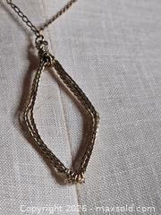 MaxSold Auction: Jewelry.   brass/ gold tone Chain with Rhombus shaped pendant - Burnaby (British Columbia, Canada) SELLER MANAGED Downsizing Online Auction - Claude Avenue