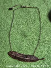 MaxSold Auction: Jewelry.  Bronze colored feather on chain. - Burnaby (British Columbia, Canada) SELLER MANAGED Downsizing Online Auction - Claude Avenue
