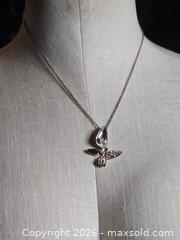 MaxSold Auction: Jewelry.  butterfly type pendant on  silver tone chain - Burnaby (British Columbia, Canada) SELLER MANAGED Downsizing Online Auction - Claude Avenue